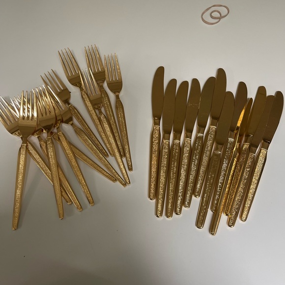 MCM gold flatware. 24 pieces